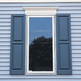 Window with Alcoa Standard Raised Panel Vinyl Shutters