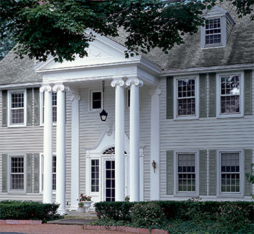 Alcoa Louver Custom Shutters on Beautiful High-End Single-Family House