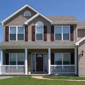 Raised Panel Vinyl External Shutters on a House